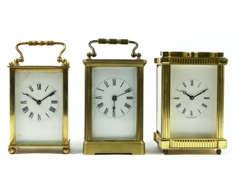A mid 20th century English carriage clock, enamelled dial with Roman numerals, 8 day movement stamped Lionel Peck London, tog