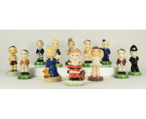 A collection of twelve Ltd edition Carltonware 'Kids' porcelain figurines, to include School Boy, Santa Claus, Footballer, Ai