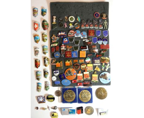 A collection of mainly motorcycle related enamel and metal lapel badges, to include TT 1979 and 80, Cadwell Park, Olivers Mou