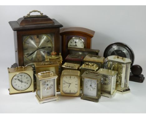 Four boxes of mantel clocks, carriage clocks, alarm clocks, having both manual and quartz movements. (4)