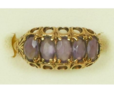 A 9ct gold Edwardian style amethyst five stone ring, K 1/2, 2.2gm 