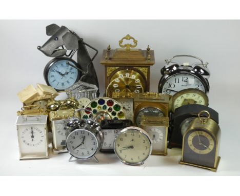 A collection of mantel clocks and alarm clocks, having manual and quartz movements. (3)
