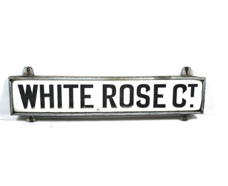 A "White Rose Court" vitreous white glass road sign, first introduced to the City of London Square Mile in the 1920's, remove