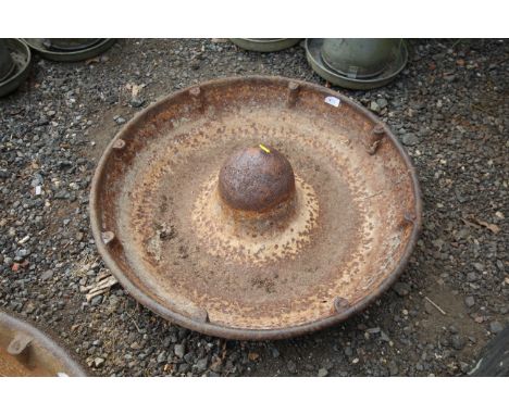 A Page &amp; Girling circular cast iron pig trough