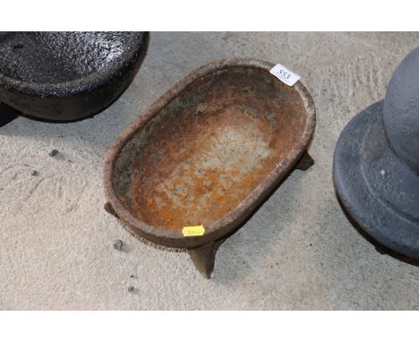 A small cast iron trough stamped Ipswich, approx. 12" long