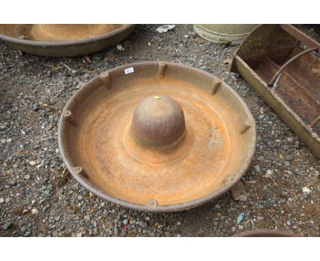 A Page &amp; Girling circular pig trough