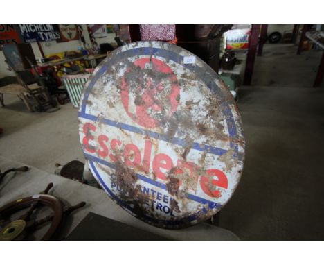 A circular enamel double sided advertising sign for "Essolene Guaranteed Pure Petrol", approx. 30" dia. AF