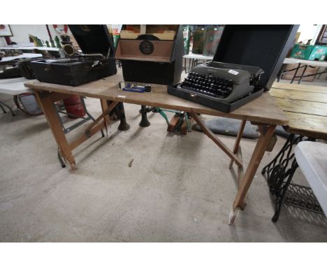 A vintage folding trestle table, approx. 55" x 26½"