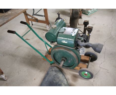 A Petter A 1.5HP stationary engine on trolley base, used once since restoration