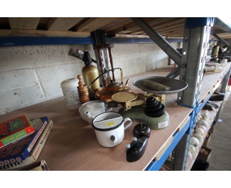 A quantity of miscellaneous items to include an egg timer, a copper and brass kettle, enamel feeding cup, a china feeding cup