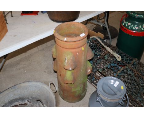 A vintage terracotta chimney pot 