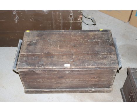 A pine trunk with later metal handles 