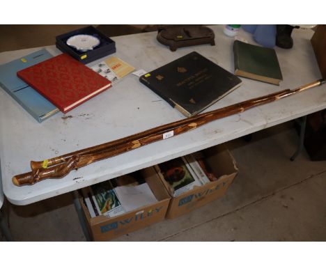 A rustic walking stick and another 