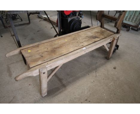 A vintage pig rendering bench