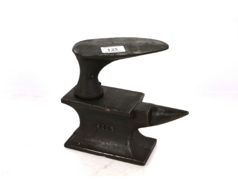 A Harper bench top anvil and last