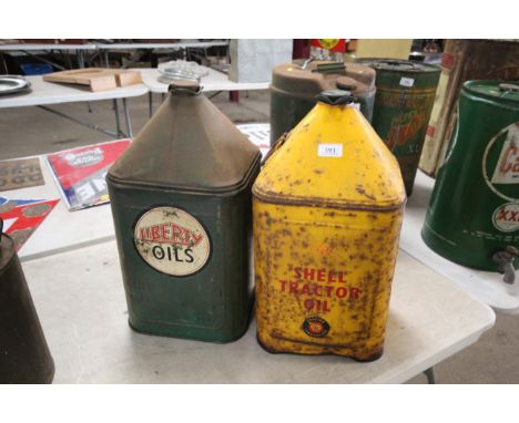 A vintage Shell Tractor Oil 40 conical drum and a Liberty Oils conical drum