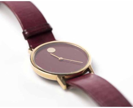 GENTLEMAN'S GOLD PLATED MOVADO ZENITH MUSEUM DIAL WRISTWATCH
manual wind movement, the maroon museum dial with gilt twelve o'