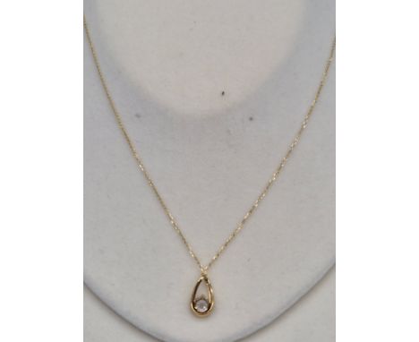 9ct yellow gold necklace with a 9ct gold and CZ Stone pendant. 1.66grams. 
