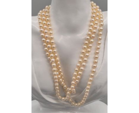 9ct yellow gold, diamond, emerald and pearl three strand necklace. 9ct yellow gold, diamond and emerald clasp and catch. Fitt