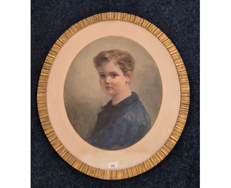 19th century watercolour portrait of a young boy. Signed and dated 1869. Fitted within an antique gilt linen fold style oval 