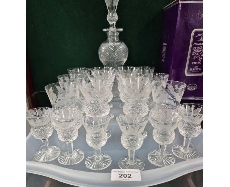 Edinburgh crystal Thistle design decanter, six whisky glasses, six wine glasses and six port glasses. Decanter comes with a b