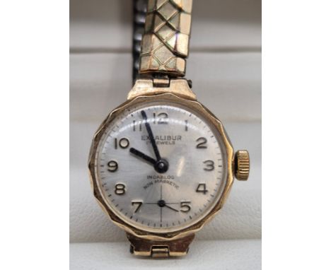 Vintage 9ct yellow gold cased ladies cocktail watch. Excalibur 17 Jewels Incabloc. Plated elasticated strap. In a working con