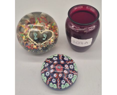 Two paperweights and ruby glass Christmas light holder; Perthshire 1.1.2 millefiori pattern paperweight, antique paperweight 