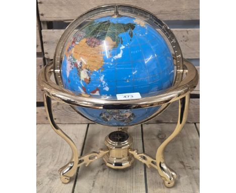 A Semi precious Globe supported on brass stand &amp; fitted compass [36cm high]