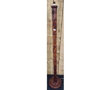 Antique Asian hand carved floor standing lamp. Having a vine and grape raised relief design. 165cm high. 