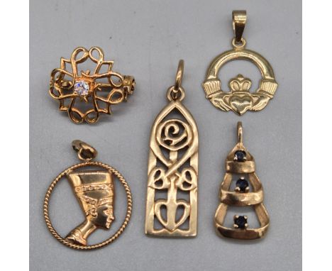 Five 9ct yellow gold pendants and brooch. Small ornate brooch with CZ Stone, 9ct yellow gold and sapphire stone pendant, 9ct 