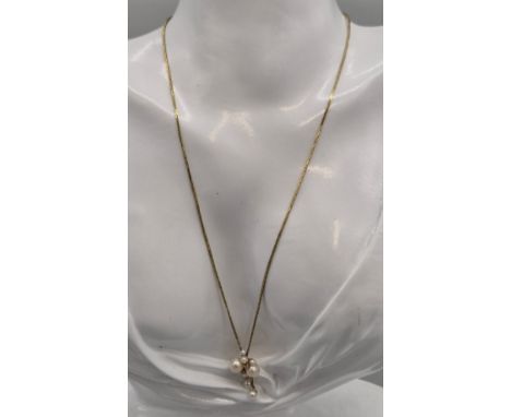 Import London 9ct yellow gold, pearl and diamond necklace. 0.06ct total diamonds. 4.61grams.