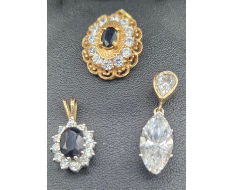 Three various gold pendants with gem stones; 18ct yellow gold, Sapphire and CZ Stone pendant- 3.89grams. 9ct yellow gold pend