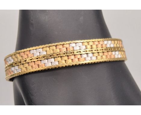 9ct three tone gold bracelet. 18cm length. 22.57grams. 