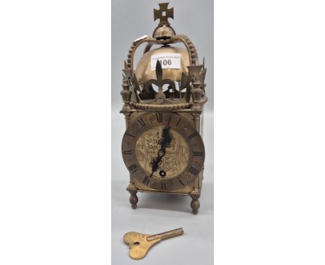 A George VI Coronation period brass lantern clock, circular Roman Dial, centred with Royal coat of Arms, the Movement strikin