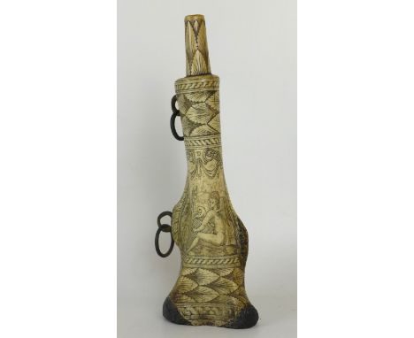A fine quality antique carved and extensively decorated Germanic shin bone powder flaskExtensively decorated with figures hol