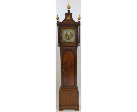 Husband Hull, an early 19th Century oak longcase clockWith arched and pillared hood over a body with arched trunk door and bo