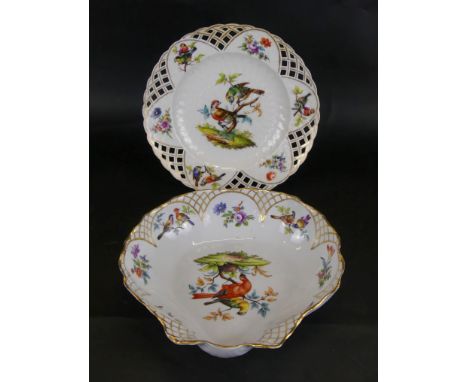 A 20th Century Meissen bowl of scallop formDecorated with birds and flowers and a gilt lattice border, together with a simila
