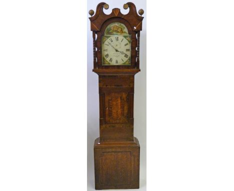 Sherwood Lyon Doncaster, a mid 19th Century oak, mahogany and rosewood crossbanded longcase clockThe hood with broken arch pe