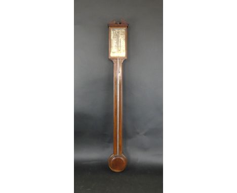 A Georgian inlaid mahogany stick barometerWith silvered dial, length 97cm, width 11.5cm    CONDITION REPORT:  Quite a lot of 