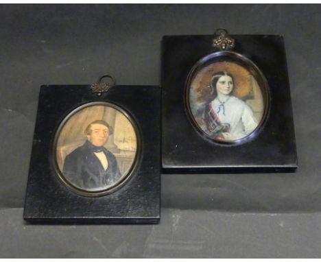 A 19th Century portrait miniature Depicting a seated Georgian gentleman, inset within lacquered frame, 9x7.5cm, together with
