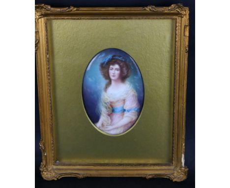A framed oval portrait on porcelain of a seated young lady Bearing signature F Micklewright the plaque probably of Paragon or