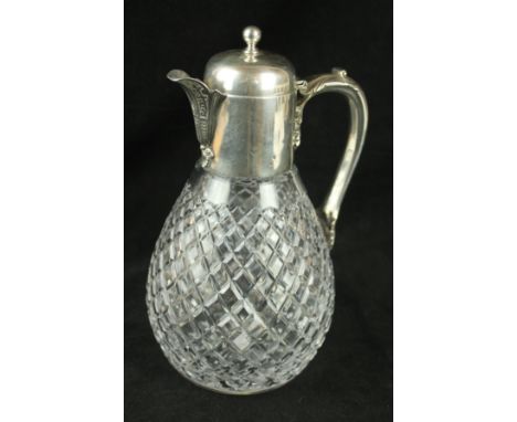 A Victorian silver and cut-glass claret jugOf baluster form, the silver top to a plain domed lid with a spherical finial, to 