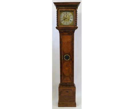 John Burrows London, an 18th Century and later walnut and seaweed marquetry inlaid longcase clockThe hood with moulded cornic