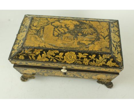 A late Regency period Penwork ladies work boxHaving Chinoiserie decoration, the hinged cover lifts to enclose original interi