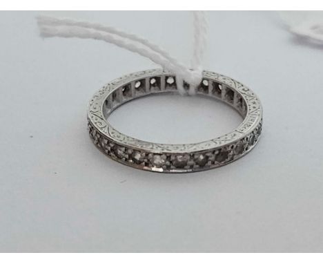 A white gold diamond eternity ring 18ct gold size P    4 gms
