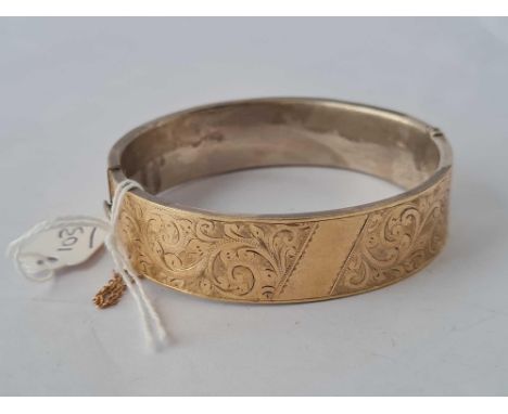 A silver gilt bangle