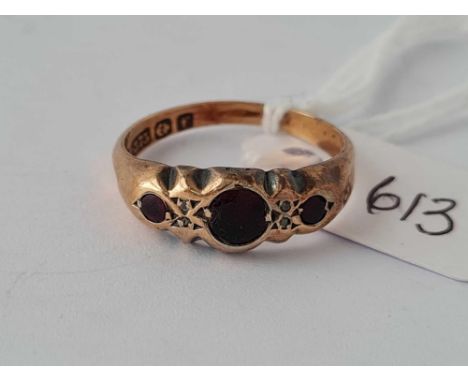 A three stone garnet set ring 9ct size N  1.5 gms
