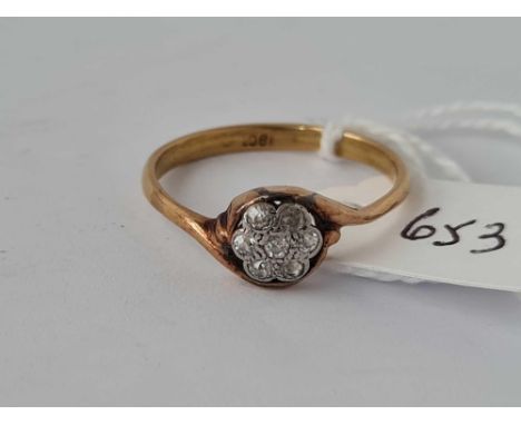 A diamond daisy cluster head ring 18ct gold size Q