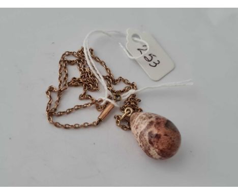 A early 20th century opal matrix egg pendant on 9ct chain 16 inch