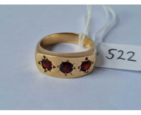 A three stone garnet ring 9ct size R 5.7 gms